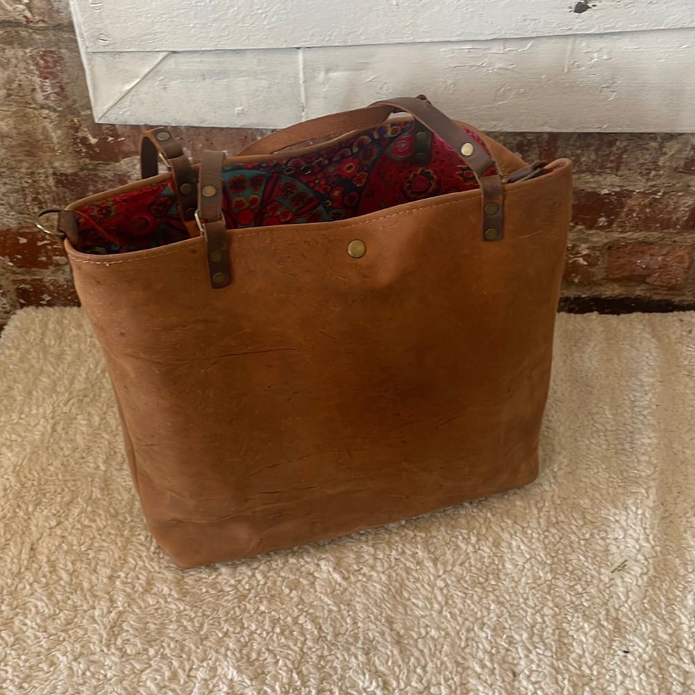 Brown distressed leather tote bag